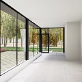 Villa Balcony With Large Glass Walls Overlooking Trees Lawn And Pink Flowers On Tiled Floor