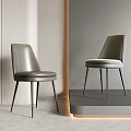 Sleek Gray Leather Dining Chair With Modern Metal Legs And Curved Backrest Design