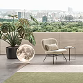 Zebra Pattern Lounge Chair With Small Side Table On Balcony City View And Green Rug