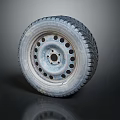 Car Tire With Wheel Rim Multiple Holes Tread Pattern And Reflection On Dark Background