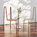 Red and Green Minimalist Leisure Chairs with Metal Legs Side Table Plant on Wooden Floor