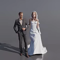 Bride and Groom Standing Together in White Wedding Dress and Formal Suit