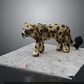 Handcrafted Cheetah Animal Model Display On Gray Platform With Spotted Pattern
