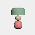 Light Green Shade Chandelier with Cream Colored Sphere and Pink Sphere Against Light Textured Wall