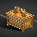 Golden Household Decorative Chest With Ornamental Objects And Long Poles