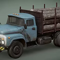 Old Blue Truck Loaded With Stacked Wood Logs For Building Materials