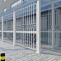 Building Ground Floor Awning For Motorcycle And Bicycle Parking With Safety Bollards And Green Shrubs