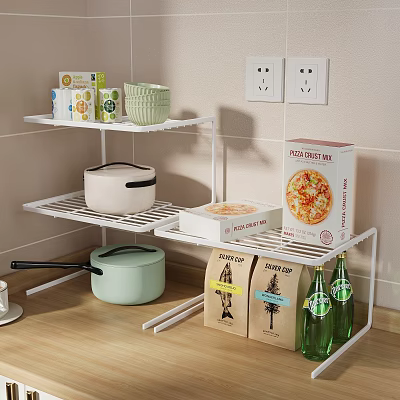 White Multi Tiered Kitchen Shelf With Cookware Pizza Box And Green Bottles 3d model