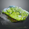 Natural Stone With Lush Green Moss Covering Its Textured Surface And Organic Details