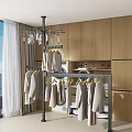 Modern Freestanding Clothes Rack With Hanging Clothes In Wardrobe And Laundry Area