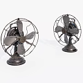 Two Vintage Electric Fans With Metal Blades And Retro Wire Cage Base