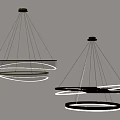 Two Modern Circular Chandeliers With Illuminated Rings And Metallic Frames