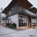 Traditional Ancient Building With Wooden Balcony Stone Lanterns And Green Plants Surrounded By Trees