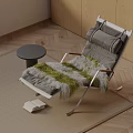 Gray Leisure Chair With Green And Gray Fur Blanket On Rug By Small Round Table