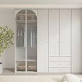 Modern White Wardrobe With Glass Doors And Drawers In Bright Bedroom Setting