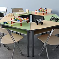Children's Desks With Green And Beige Surfaces Building Blocks And Toy Cars