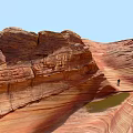 Red Rock Landscape With Wave Like Patterns And Standing Person Under Blue Sky 3d model