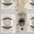 Modern Ceramic Dinnerware Set With Striped Placemats Decorative Glassware And Dried Plant Decor
