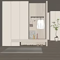 Modern Entryway Shoe Cabinet With Clothes Hanger White Top Bag Shoes And Decorative Plant
