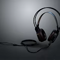 Over ear Headphones Featuring Sleek Black Design Leather Ear Cups and Coiled Cable