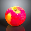 Fresh Red and Yellow Apple with White Spots and Glossy Surface on Black Background