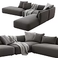 Comfortable Modern L Shaped Sectional Sofa with Gray Pillows and Throw Blanket