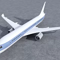 Modern White and Blue Passenger Jet Parked on Airport Tarmac With Large Wings and Engines