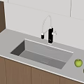 Stainless Steel Kitchen Sink With Black Faucet On White Countertop And Light Wooden Cabinets