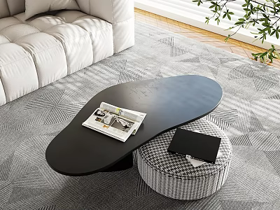 Black Irregular Shaped Coffee Table With Magazine On Top And Plaid Ottoman Beside 3d model