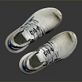 White Sports Shoes With Blue Accents And Mesh Material For Casual Wear