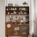 Wooden Sideboard With Glass Doors Open Shelves And Kitchen Items In Natural Light