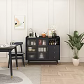 Dining Room Black Sideboard With Glass Doors Vase Tea Set And Potted Plant