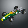 Green and yellow race car model with four wheels white dot and reflective gray background