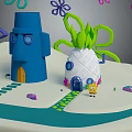 Cartoon Style Pineapple House And Blue Tower With Green Curly Plants Pathway And SpongeBob Character