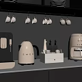 Modern Kitchen Interior With White Countertop Appliances Black Cabinets And Hanging Mugs