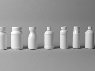 White Plastic Bottles With Different Shapes Arranged In Row For Containers 3d model