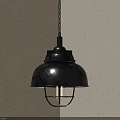 Black Metal Pendant Light With Dome Shade And Cage Lit Bulb Against Gray Textured Wall