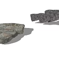Two Groups of Textured Stones on Gray Background with Natural Surface Details