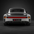 Silver Porsche Classic Sports Car With Sleek Body Design And Brown Leather Interior