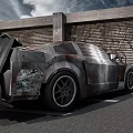 Rusty Modified Sports Car Parked By Concrete Garage With Graffiti Wall