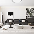 Modern Living and Dining Room With Gray Sofa White Round Coffee Table Black Accent Chair