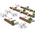 White Outdoor Table And Chair Set With Wooden Dividers And Green Plants