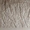 Elegant Modern Textured Background Wall with Natural Stone Panel Design and Minimalist Style