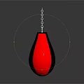 Red And Black Punching Bag Design With Hanging Chain On Dark Background