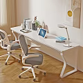 Modern White Desk With Two Gray Chairs Laptop Desk Lamp Books Plant On Wooden Floor