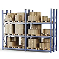 Metal Warehouse Storage Shelves With Multiple Levels Holding Cardboard Boxes On Pallets