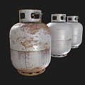 Three Industrial Propane Tanks Showing Various Degrees of Wear and Rust
