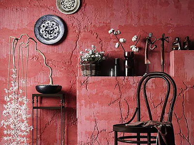 Stylish Leisure Chair in Room with Textured Red Wall Hanging Decorative Plates and Flowers 3d model