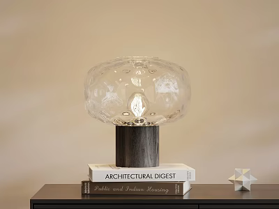 Crystal Table Lamp on Architectural Digest Book Stack with Star Decor and Beige Wall 3d model