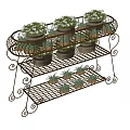 Bonsai Potted Plants on Iron Two Tier Plant Stand with Woven Baskets and Green Foliage